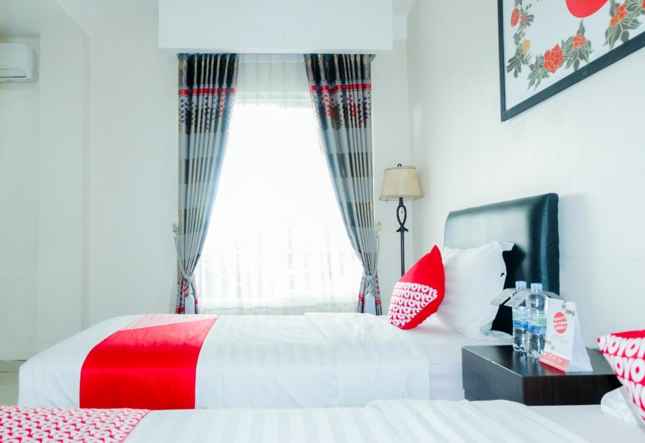 Oyo 696 Hasanah Guest House Syariah De Saphire Malang Kültér fotó